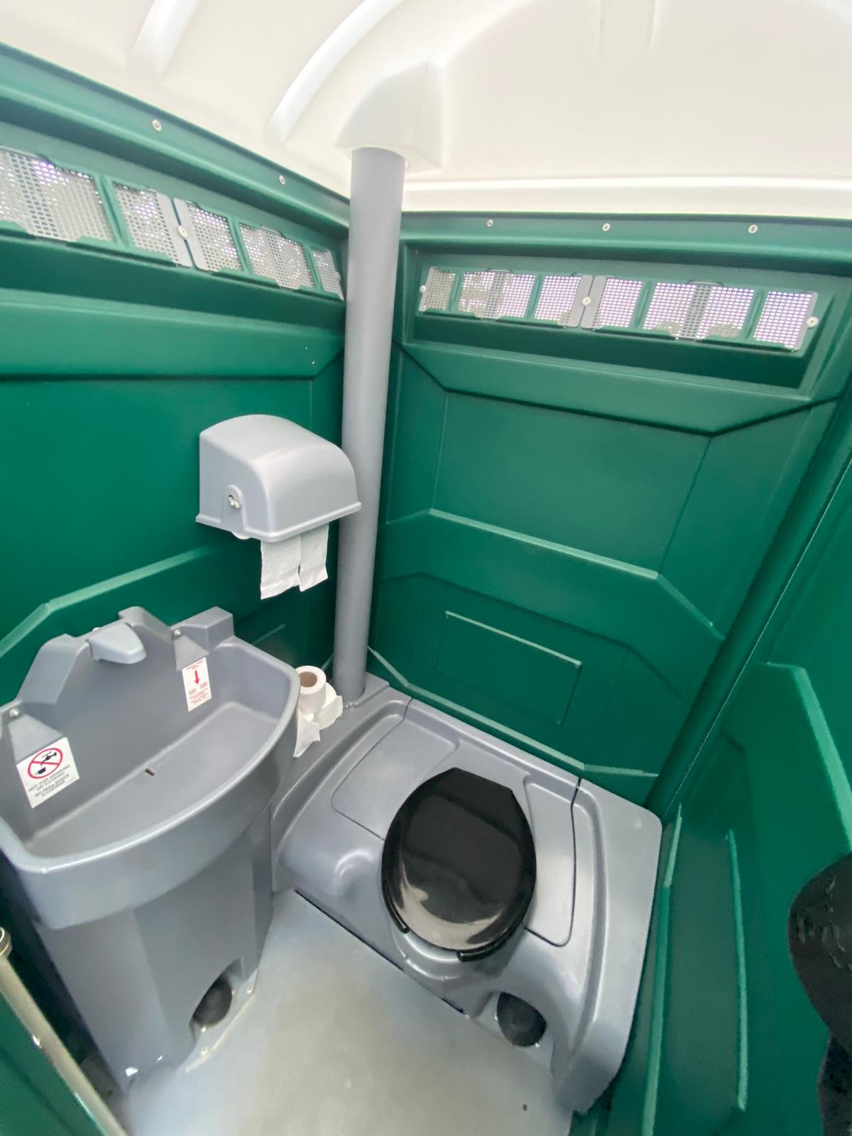 Inside Premier Flush portaloo portable toilet